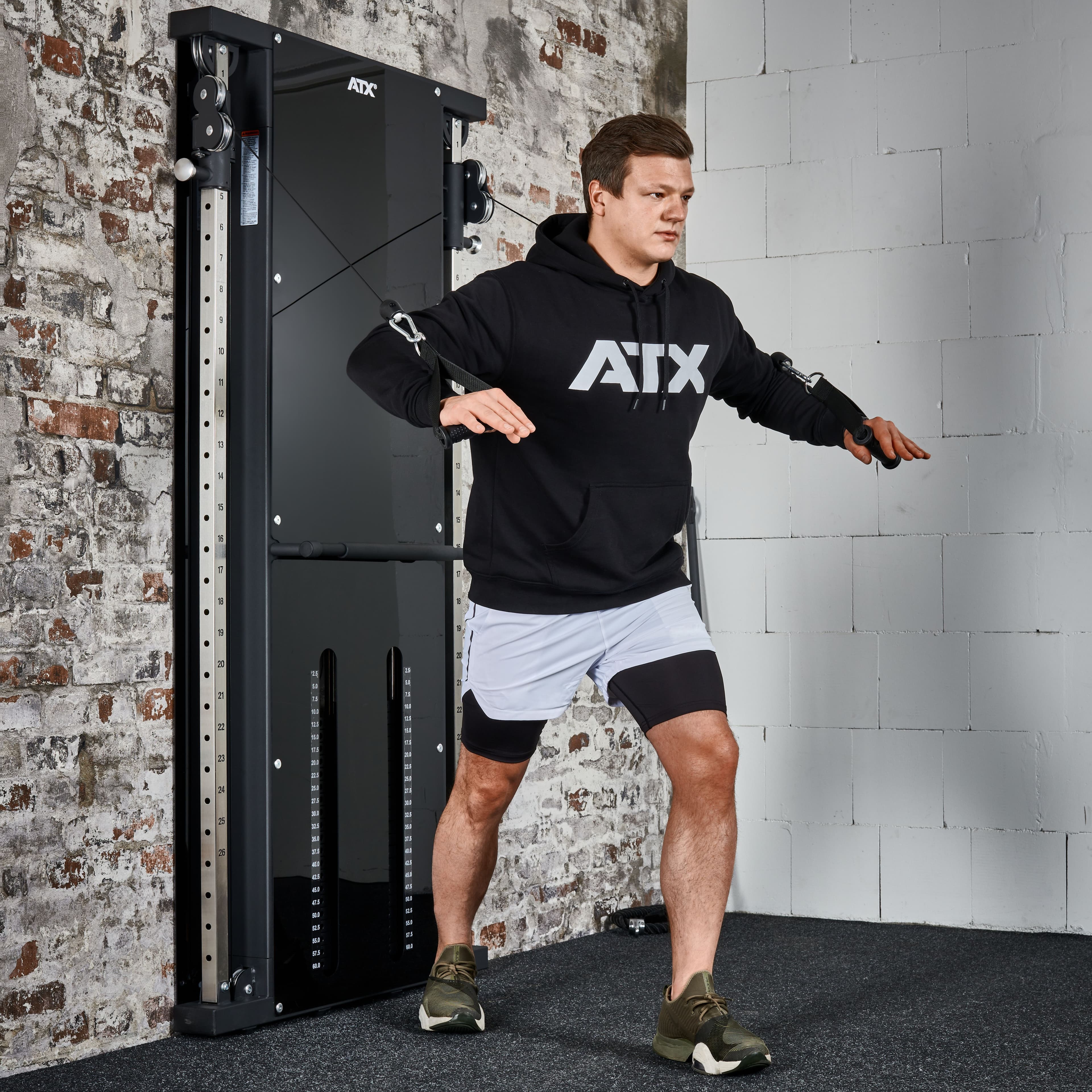 ATX Duo wall-mounted pulley station with 2 x 60 kg weight plates