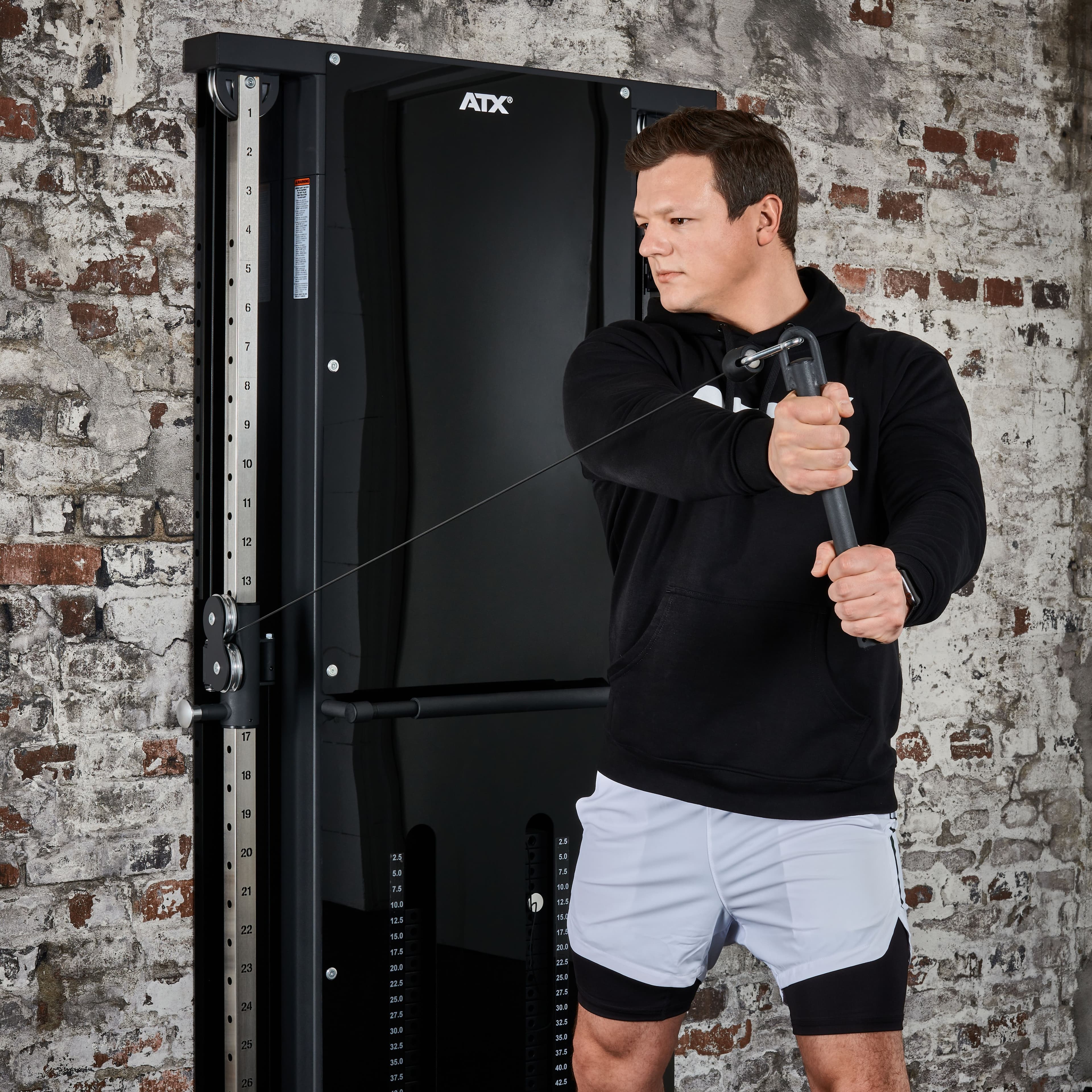 ATX Duo wall-mounted pulley station with 2 x 60 kg weight plates